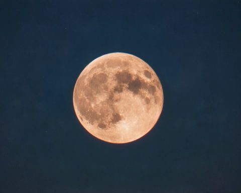 Experience the Mystical Beauty of a Lunar Spectacle: A Blood Moon Graces the Night Sky Experience the Mystical Beauty of a Lunar Spectacle: A Blood Moon Graces the Night Sky